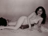 Pretty Smiling Vintage Woman Laying On Her Side - vintage